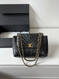 CHANEL Emerald Green V-Shaped Shoulder Bag – Oil Wax Leather
