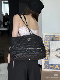 CHANEL Black Silver Puff Cloud Tote 17 – Quilted with Silver Hardware