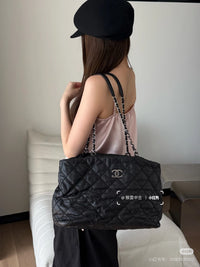 CHANEL Black Silver Puff Cloud Tote 17 – Quilted with Silver Hardware